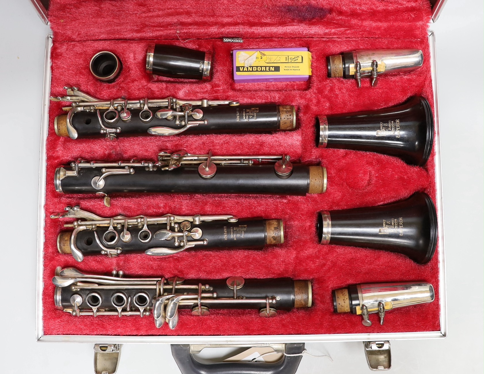 A cased set of A and B flat Boosey & Hawkes Emperor ebony clarinets